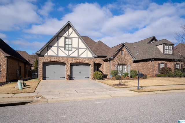 tudor house featuring a garage and cooling unit