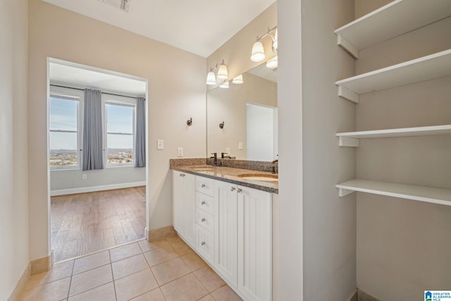 bathroom with vanity and tile patterned floors