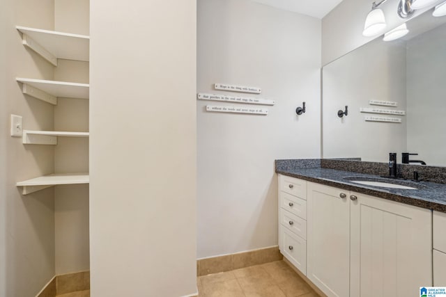 bathroom with vanity and tile patterned floors