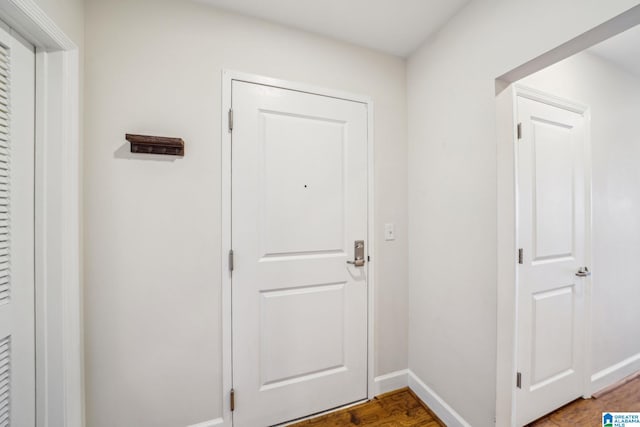 doorway featuring hardwood / wood-style floors