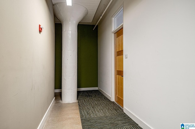 hallway with carpet