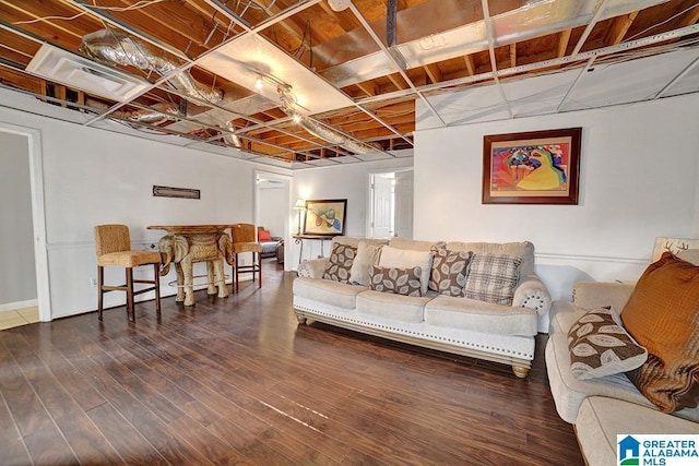 living room featuring dark wood-type flooring