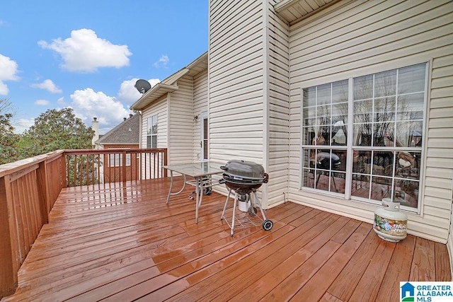 wooden deck with grilling area