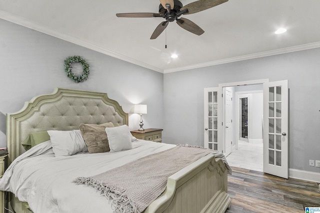 bedroom with dark hardwood / wood-style flooring, ceiling fan, french doors, and ornamental molding