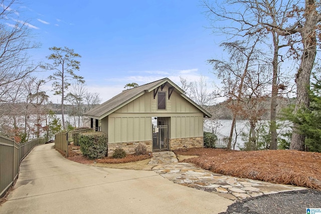 view of front of home featuring a water view