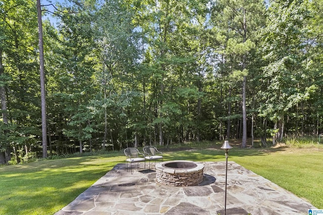 view of patio with an outdoor fire pit