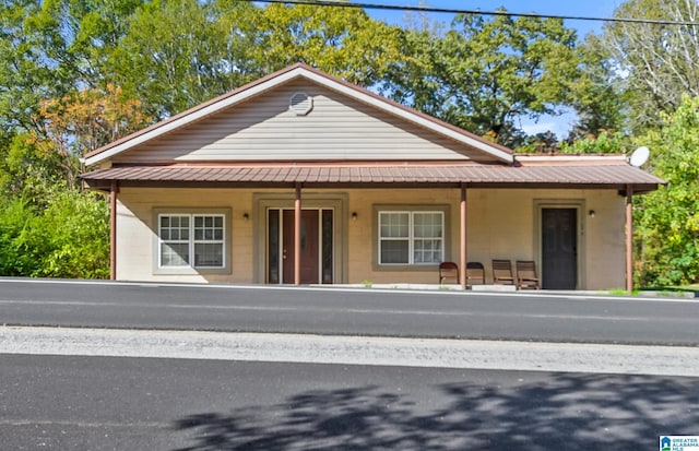 view of front of home featuring covered porch