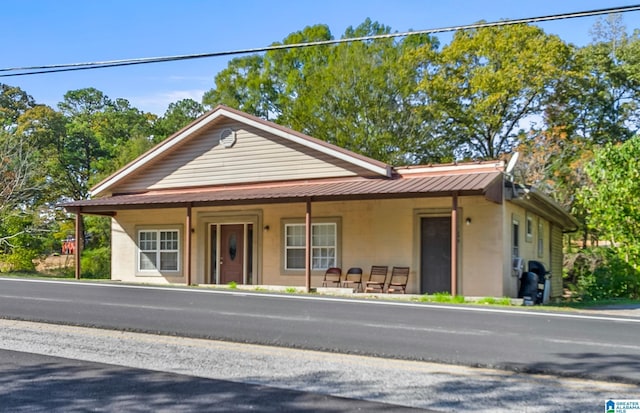 view of front of home featuring covered porch