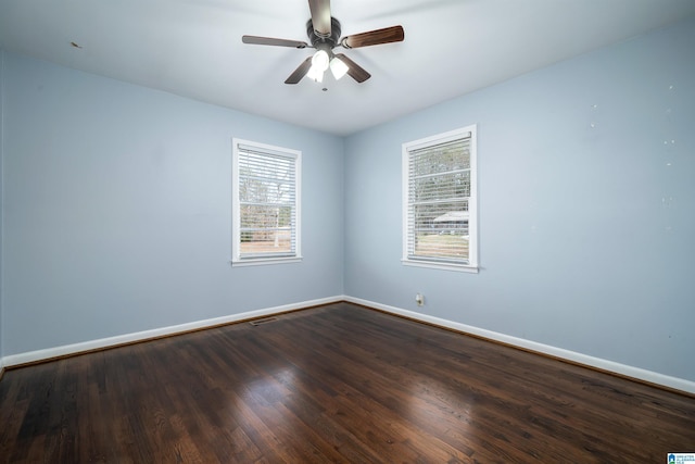 spare room featuring ceiling fan and hardwood / wood-style floors