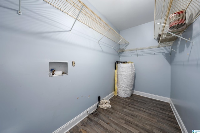 laundry room with hookup for a washing machine and dark hardwood / wood-style flooring