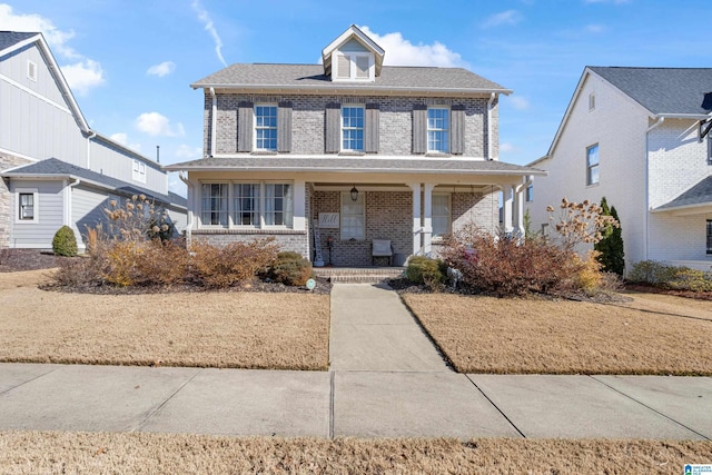 view of property featuring a porch