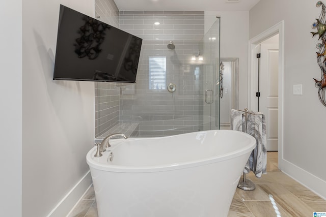 bathroom with tile patterned flooring and independent shower and bath