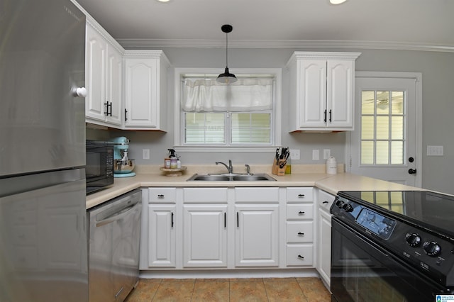 kitchen with sink, white cabinetry, ornamental molding, and black appliances