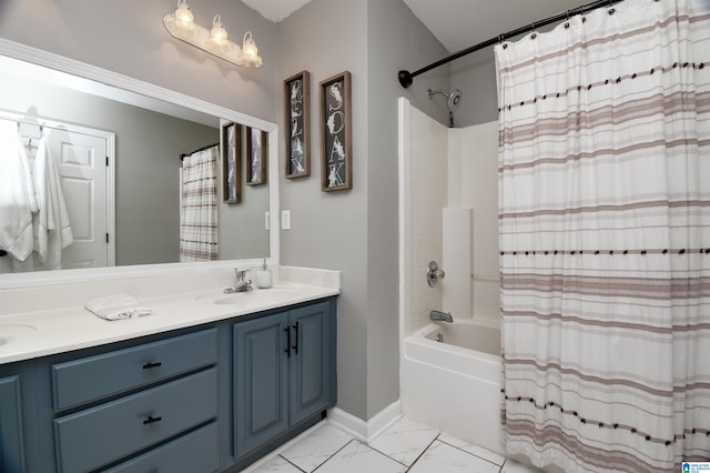 bathroom featuring vanity and shower / tub combo with curtain