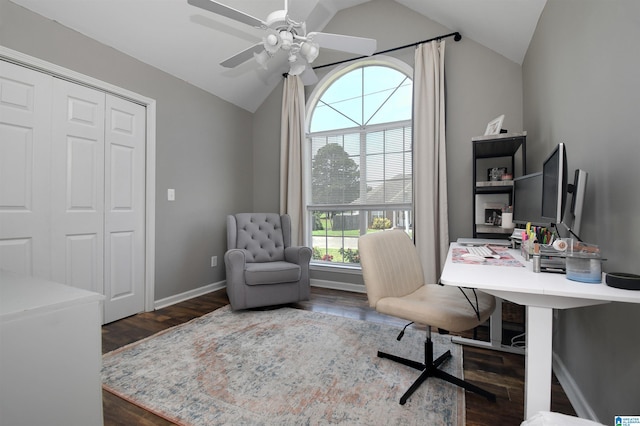 office space featuring dark hardwood / wood-style floors, vaulted ceiling, and ceiling fan