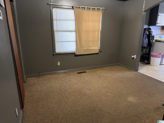 empty room featuring washer / dryer