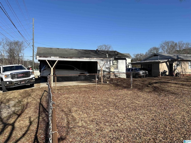 exterior space with a carport