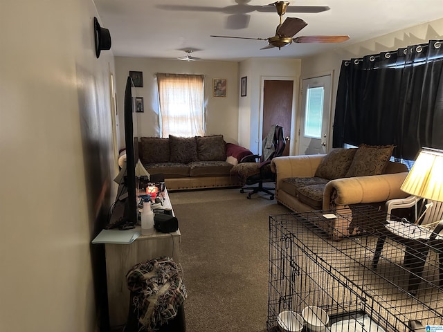 living room with ceiling fan and carpet floors