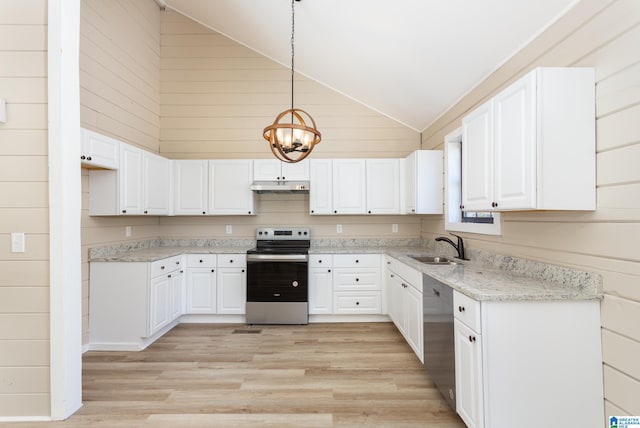 kitchen featuring high vaulted ceiling, stainless steel electric stove, white cabinets, hanging light fixtures, and light stone countertops