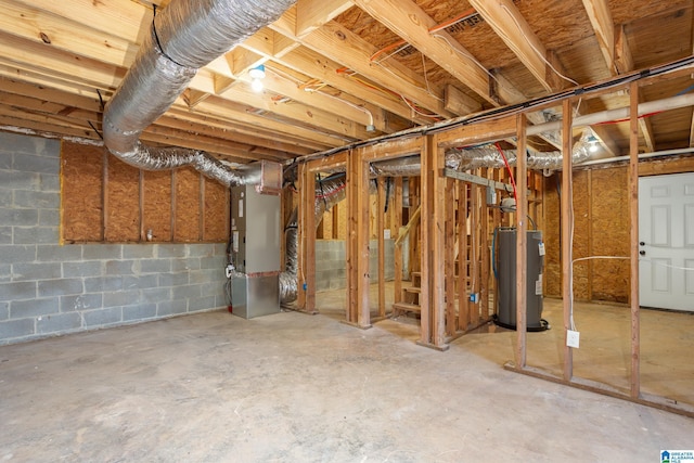 basement featuring heating unit and water heater