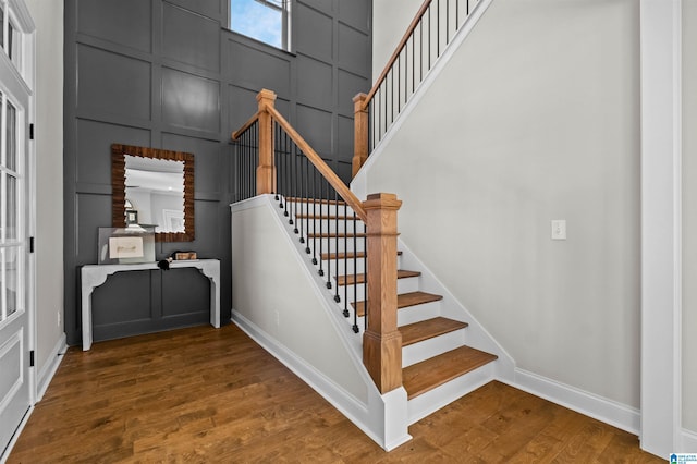 stairs with wood-type flooring