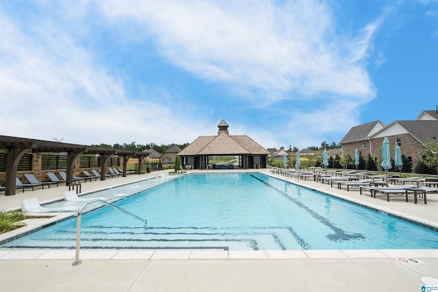 view of swimming pool featuring a gazebo and a patio area