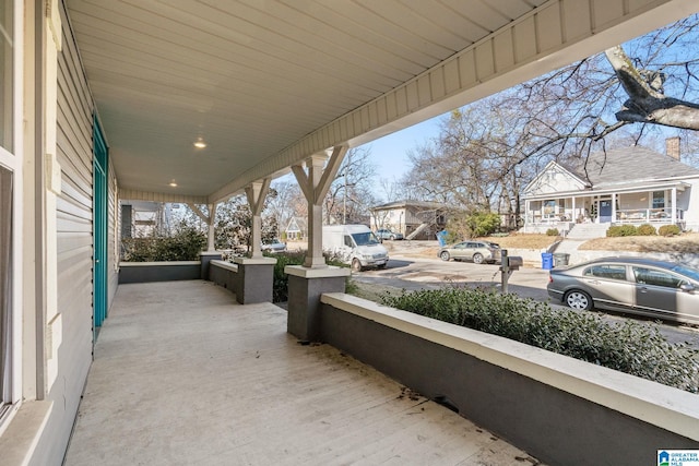 view of patio featuring a porch