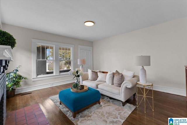 living room with dark wood-type flooring