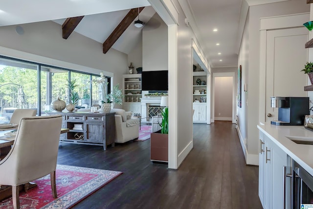 living room featuring high vaulted ceiling, beam ceiling, and dark hardwood / wood-style flooring