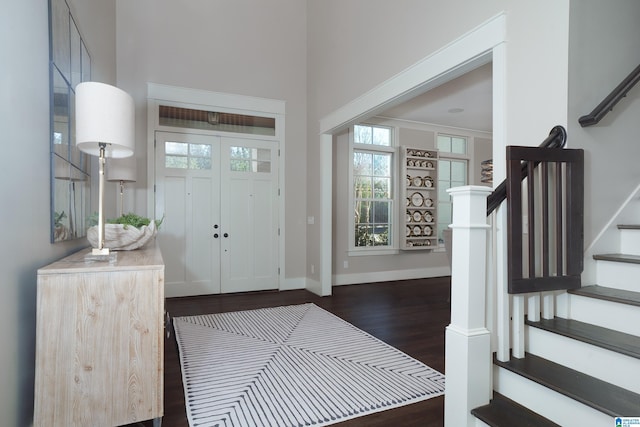 entryway with dark wood-type flooring