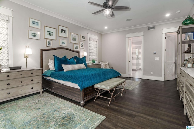 bedroom featuring ceiling fan, dark hardwood / wood-style flooring, crown molding, and ensuite bath