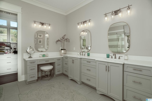 bathroom with vanity, tile patterned floors, and ornamental molding