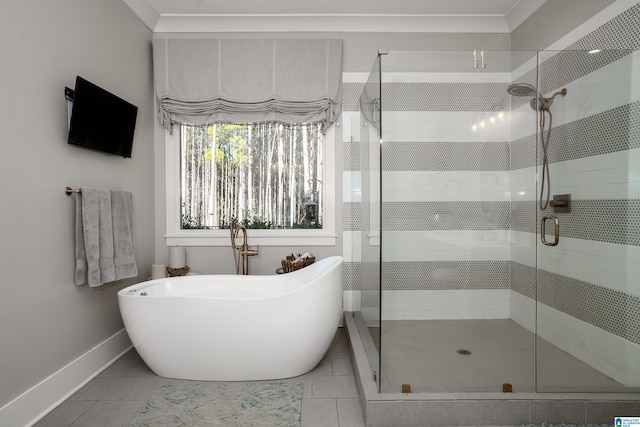 bathroom featuring tile patterned floors and independent shower and bath