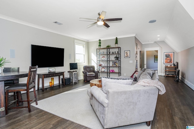 living room with ornamental molding, dark wood-type flooring, lofted ceiling, and ceiling fan