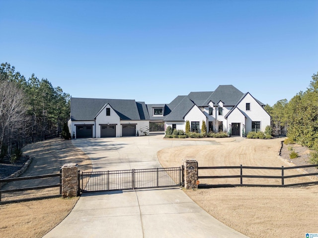 french country home with a garage