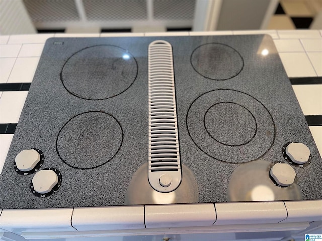 interior details featuring electric cooktop