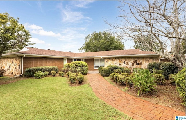 ranch-style house with a front yard