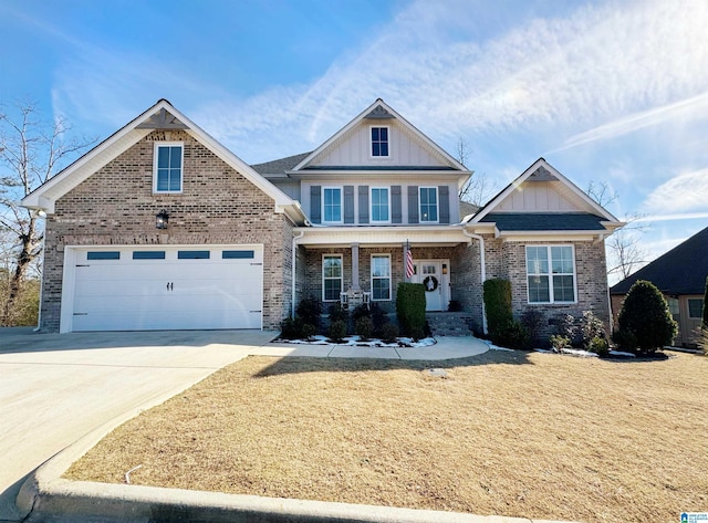 craftsman house featuring covered porch and a garage