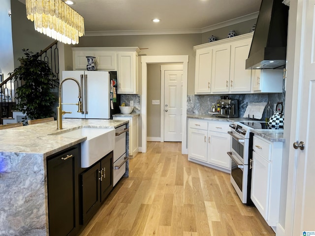 kitchen featuring range hood, backsplash, white cabinets, and white appliances