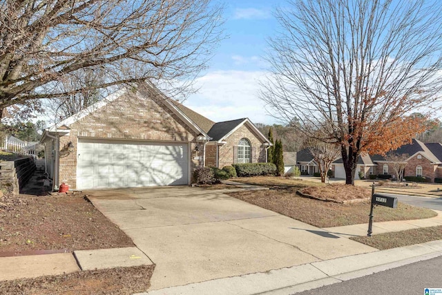 ranch-style house featuring a garage