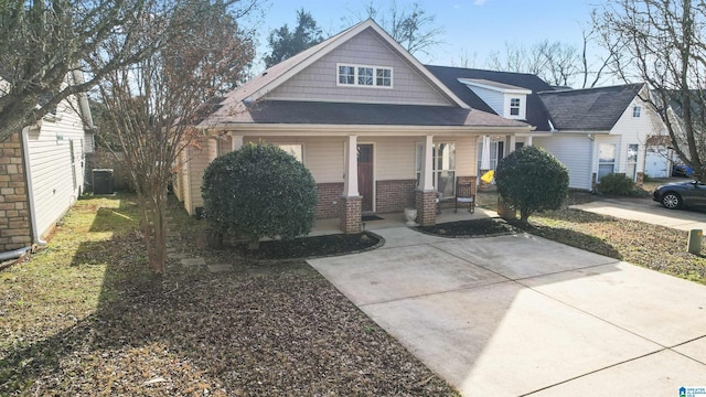 view of front of house featuring a porch and central air condition unit