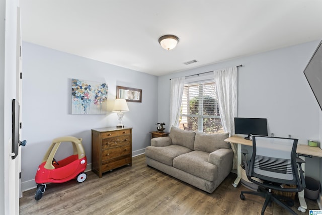 office area with hardwood / wood-style floors