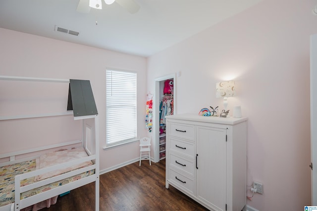 misc room with dark hardwood / wood-style floors and ceiling fan