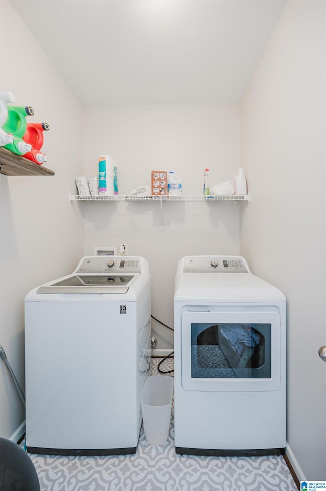 washroom featuring independent washer and dryer