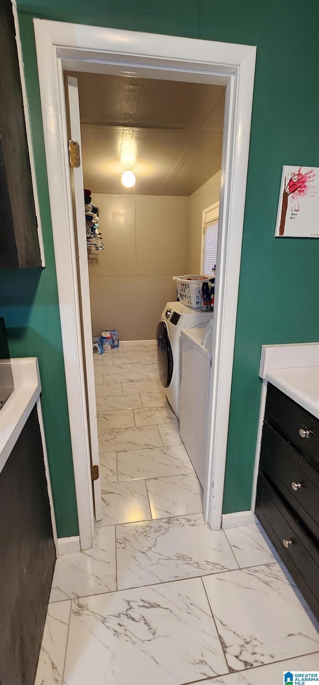 laundry room with separate washer and dryer