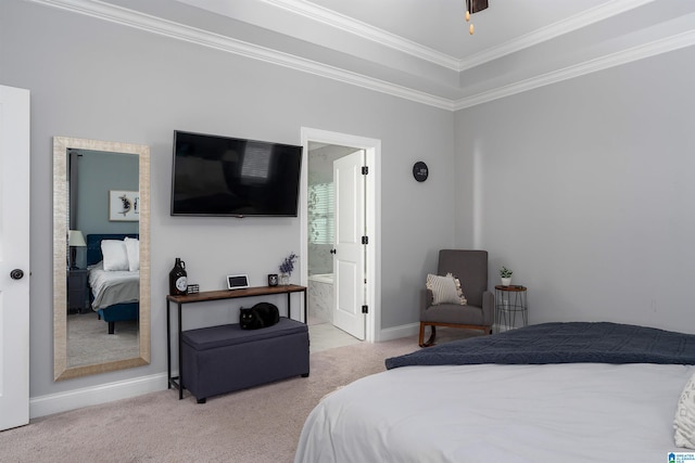 bedroom featuring ensuite bath, ceiling fan, light colored carpet, and ornamental molding