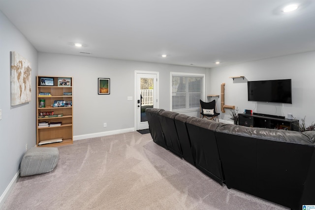 living room featuring light colored carpet