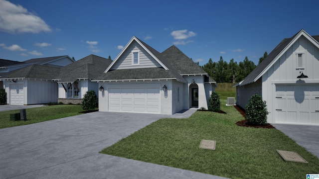 view of front of house with a garage and a front yard