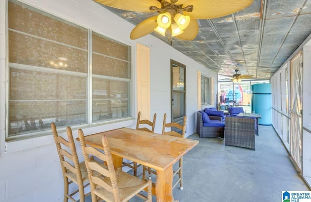 sunroom / solarium with ceiling fan