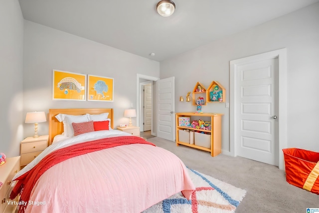 bedroom featuring light colored carpet